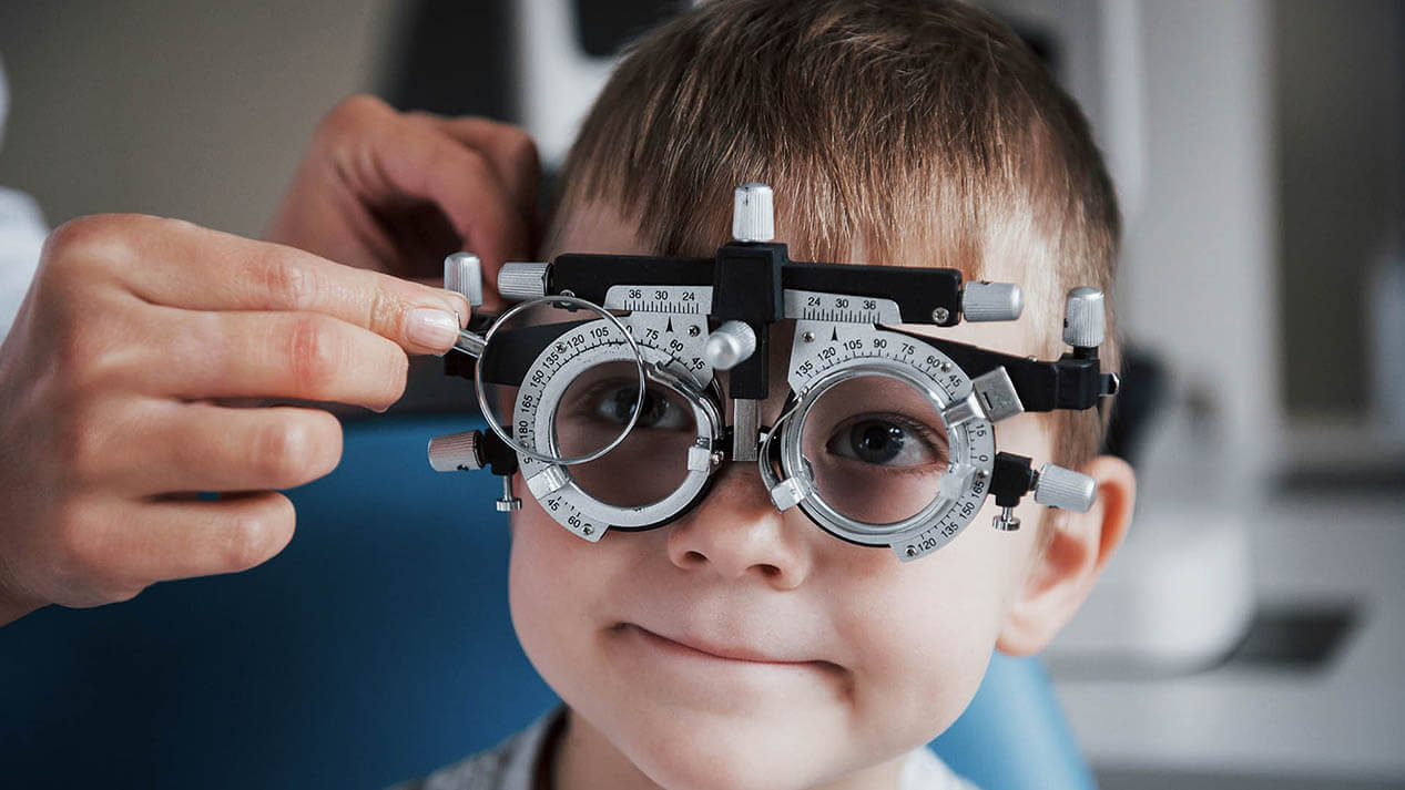 Child taking eye exam