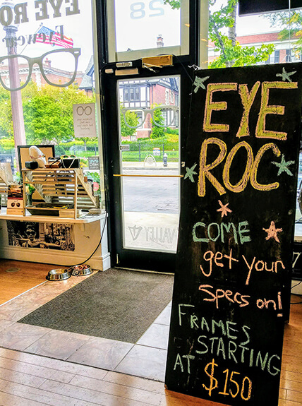 Interior of Eye Roc eyeglasses shop with view of front door from the inside.